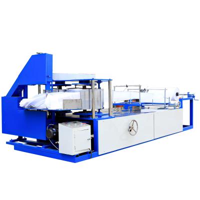 China Hotels nonwoven fabric folding cutting machine for disposable nonwoven bath towel for sale