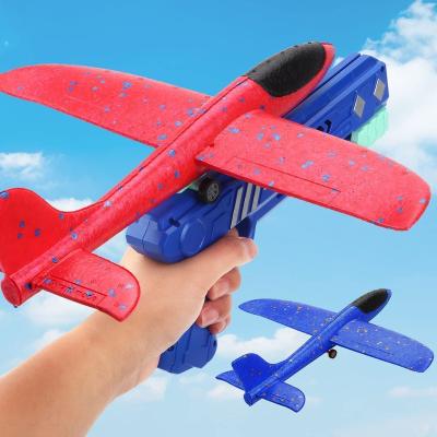 China Amazon 918-1 Hot Selling Outdoor Kids Flying Toy Airplane Launcher Gun Airplane Toys for sale