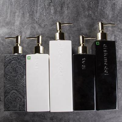 China Bathroom Accessories Durable Black And White Embossed Pattern Black Ceramic Luxury Ceramic Accessory Set Shower Gel Shampoo Container for sale