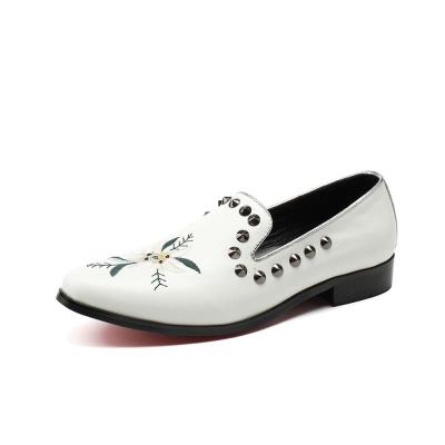 China Fashion trend rivet decoration genuine leather slip on floral embroidery flat punk loafer shoes for men for sale