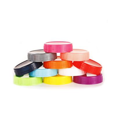 China Non Spill 86 Mm Plastic Screw Cap Colored Mason Jar Lids Fits Wide Plastic Mouth for sale