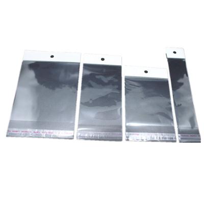 China OPP Moisture Proof Printing Clear Plastic Self Adhesive Bag With Header for sale