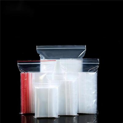 China Recyclable Small Resealable To Big Snacks Cookie Candy Flat Transparent Food Packaging PE Plastic Zip Lock Bags for sale