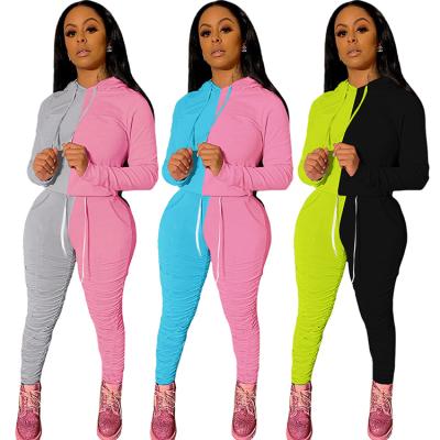 China 2021 Autumn Lady 2 PCs Breathable Patchwork Stacked Yoga Wear Hooded Sweatsuit Bodycon Women's Two Piece Set for sale