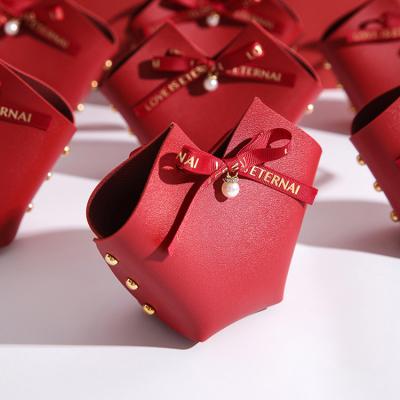 China Small Handmade Sweet Wholesale Leather Chocolate Bag Happy Party Box Candy Bag Sugar Gift for sale