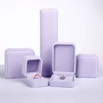 China Custom Factory Price Luxury Purple Pink Velvet Jewelery Gifts Packaging Jewelry Box With Logo Earring Rings Bracelet Organizer Gift Box for sale