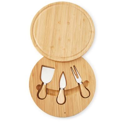 China Custom Logo Charcuterie Serving Tray Round Pizza Cutting Board Stocked Bamboo Cheese Board and Knife Set with Drawer for sale