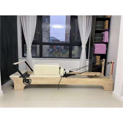 China Most Popular Fitness Equipment Body Maple Pilates White Wood Reformer With Boarding 2450X740X720mm for sale