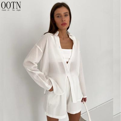 China OOTN Transparent Wide Leg Breathable Women's Vacation Shorts Suits White Long Sleeve Tops Woman 2 Piece Shorts Set Summer Linen Shorts for sale