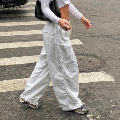 China OOTN Women's Casual Loose Wide Leg Sweatpants Streetwear Low Waist Drawstring Trousers Joggers Breathable Hippie White Loose Cargo Pants for sale