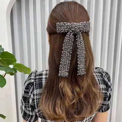 China Top Fashion Diamond Beaded Horsetail Korean Pearl Headdress Accessories 2022 Bow Clip Glass Clip for sale