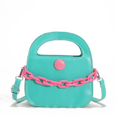 China Fashion Pure Color PU Arched Handbag Candy Color Resin Chain Saddle Shape Handbag for sale