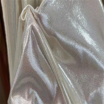 China Metallic foil beachwear printed fabric polyester spandex printed swimwear gold foil printed fabric for sale