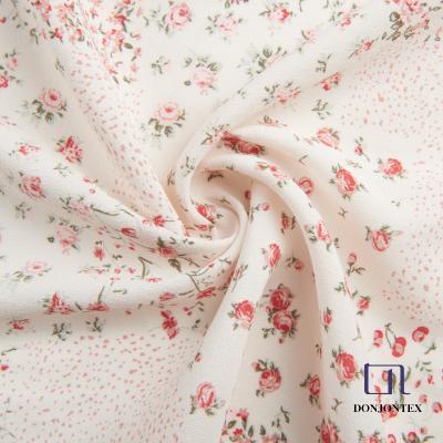 China Viable Hot Sales 100% Rayon Fabric Small Flowers Print Soft Crepe Draping Fabric For Dress, Blouse And Skirts for sale