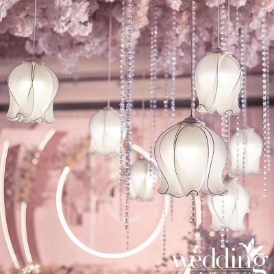 China hot selling selling wedding ceiling bell lily chandelier 10 bell lily bud pendant channel stage top decoration 2m*3m for sale