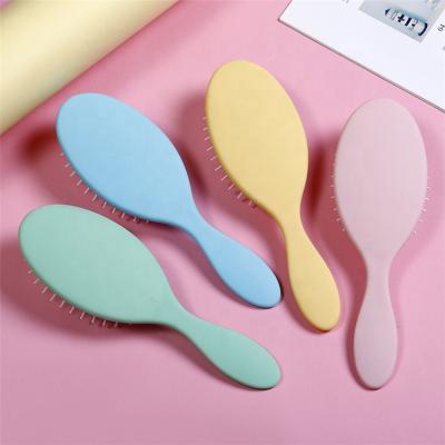 China Hot Selling Travel Amazon Solid Color Airbag Comb For Girls Oval Cushion Paddle Hair Brush Massage Scalp Brush for sale