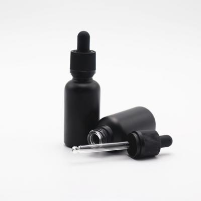 China Hot sale e cbd oil 30ml cosmetic liquid matte frosted black glass dropper bottle with measuring pipette for sale