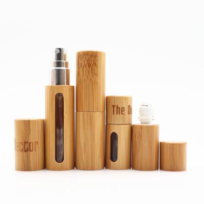 China 5ml 10ml 15ml Cosmetic Portable Mini Essential Oil Bottle Roll On Oil Bottle Bamboo Perfume Glass Bottle for sale