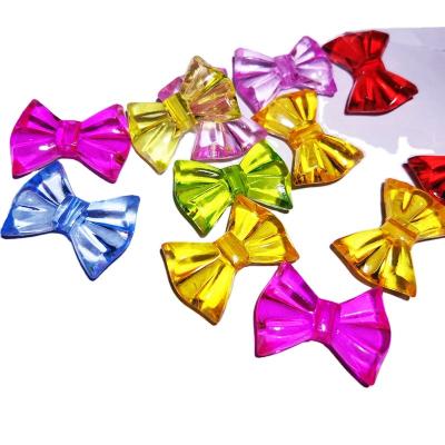 China Necklace and Bracelet Making Wholesale 26*19mm Colorful Bow Knot Plastic Transparent Acrylic Beads for sale