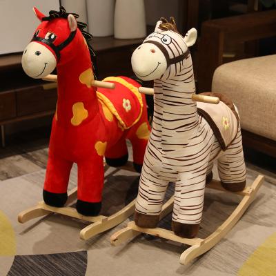 China Cartoon Toy Wholesale Retail Customized Early Education Rocking Horse Rideable Plush Toy for sale