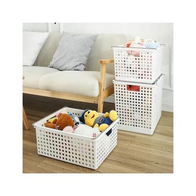 China Nordic Style Oversized Hand-Held Laundry Basket With Wheels Hollowed-Out Plastic Storage Basket Toys storage basket for sale