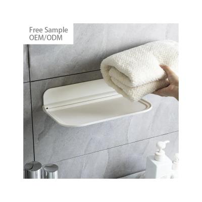 China Punch-free Cheap Plastic Wall Mounted Soap Organizer Dish Plate Towel Holder Foldable Storage Shelf For Bathroom Accessories for sale