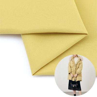 China Breathable 85gsm 50D Matt Memory Coat Imitation Polyester Plain 100% Fabric for sale