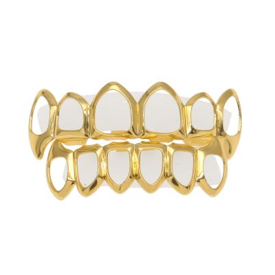 China Hot Sale Hiphop Accessories Gold Braces Hollow-carved Design Jewelry Teeth Grillz for sale