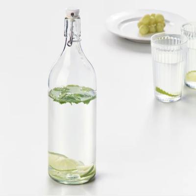 China Manufacture Customized Crystal Glass Bottle Decaled LOGO 300ml 500ml 750ml 1000ml Clear Beer botella De Wine Storage Liquor Bottle for sale