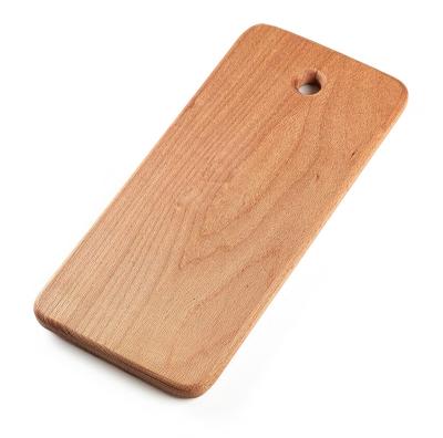 China Sustainable Small Mini Wood Kitchen Kids Cutting Boards Wooden Kids Serving Board With Hole for sale