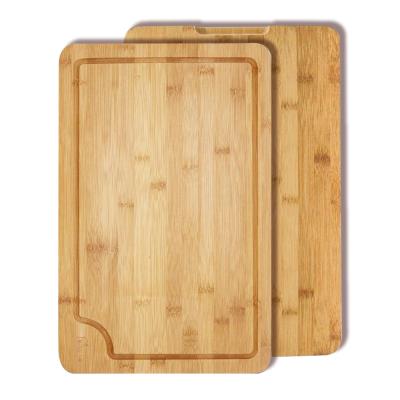 China BAMBOO in 2020, sell like hot cakes with sink and handle design extra large organic bamboo cutting board for sale