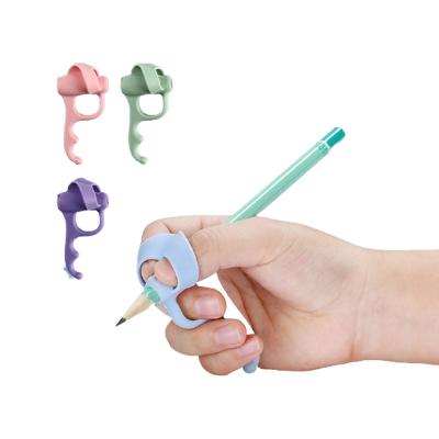 China New type promotion and top selling school supplies students learning tool writing aid pencil grips tpr pen grip holder wholesale for sale