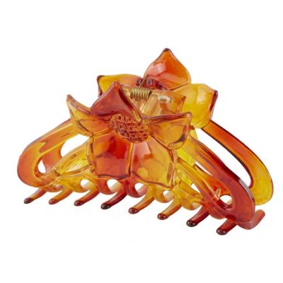 China Flower Blossom Octopus Butterfly Hair Clips Hair Bun Bun Clasps Clamps Up Fancy Plastic Hair Claw For Women for sale