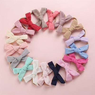 China Tie Hair Bow Nylon Bands 12 Pack Knot Cotton Canvas Bowknot Baby Hair Bows Slim Stretchy Skinny Elastic Super Soft Naked Nylon Headband for sale