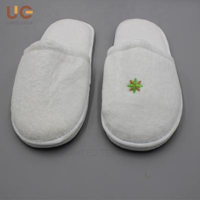 China Disposable Logo Disposable Hotel Slipper Coral Fleece Hotel Slippers Luxury Customized White Plush Eco-friendly Disposable Amenities Exquisite Eco-friendly Soft Customized Slippers for sale