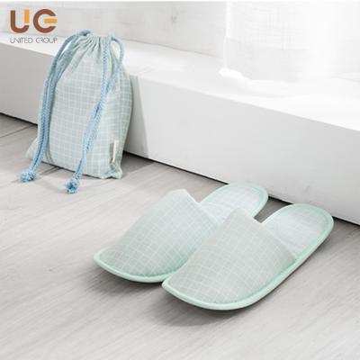 China Lightweight Hotel Slippers Travel Supermarket Foldable Airline Home Slippers With Pocket Women Men for sale