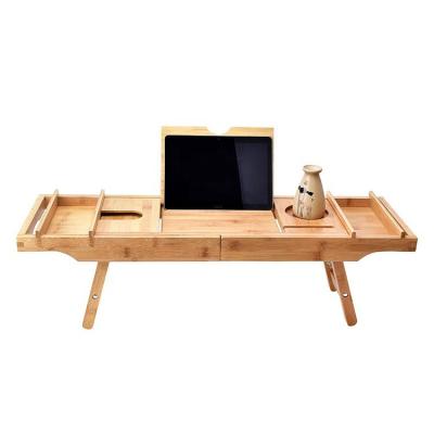 China 2 in 1 Expandable Bamboo Tub Caddy Bed Trays Laptop Bed Desk with Folding Legs Tub Tray with Wine Glass Holder for sale