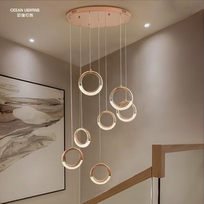 China OCEAN pendant lamp earring style LED Three-color light bar living room gold modern bedroom pendant light for sale