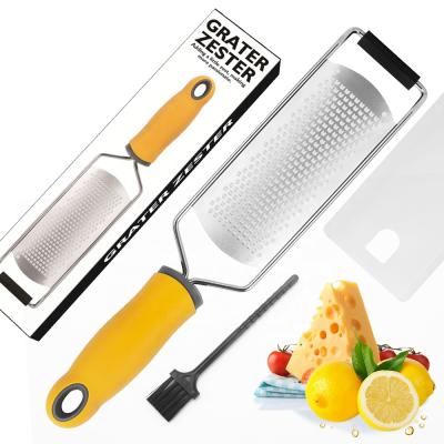 China Long Lemon Zester Manual Kitchen Multifunctional Viable Cutter Stainless Steel Vegetable Carrot Cheese Grater With Handle for sale