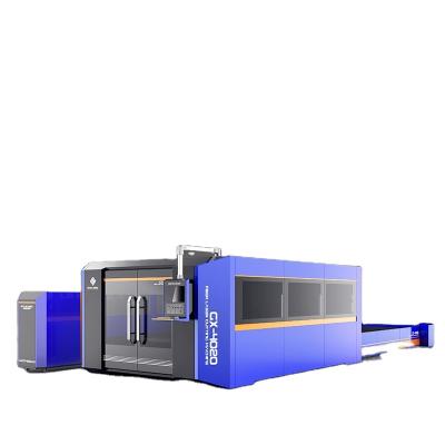 China Traded table + full cover automatic Gxucnc tube metal cutting machine fiber laser cutting machine for sale