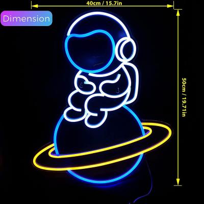 China Retail Store Astronaut Sitting On The Planet For Bedroom Interior Decor Or Play Center Kids Space Gift LED Lighting Custom Neon Sign for sale