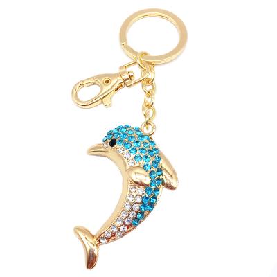 China Cute Cute Rhinestone Crystal Zinc Alloy Dolphin Keychain Graduation Series Ocean Key Chain Pendant For Car Keys for sale