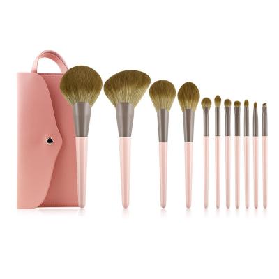 China Angular Blush Wholesale 11 Pcs Brush Up Makeup Set Pink Concealer Premium Powder Eyeshadow Foundation Makeup Brush Set Custom Logo for sale