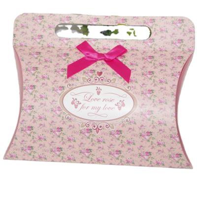 China New Design Flower Pattern Recyclable Wholesale Paper Gift Bag Cheap Packaging Bag With Beautiful Butterfly Bow for sale