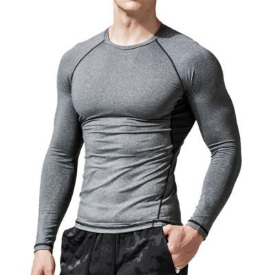 China Custom Breathable QUICK DRY Solid Color Logo Long Sleeve Tights Men T-shirt Sports And Fitness Compression Training Tee For Men for sale