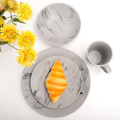 China Sustainable New Style Ink Painting Table Set Wholesale Customized Sandstone Dinner Set for sale