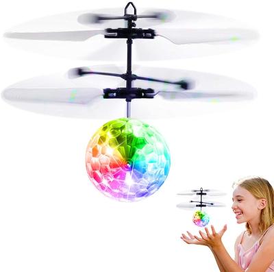 China Mini Crystal Ball Toy Children Gift Hot Selling Flashing Helicopter Flying Toys Hand Sensor Flying Ball Border E-commerce LED Light Drone for sale