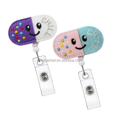 China Wholesale Custom Logo Felt Badge Holder With School/Nurse Reel Medical Badge Retractable Plastic ID Badge Reels With Clip for sale