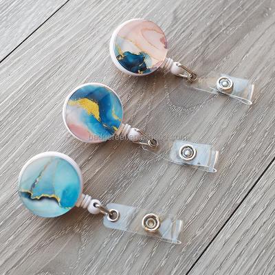 China New Popular Marbling Retractable Desk Holder Badge Reel For Office Worker Doctor Nurse Badge Reel Pull ID Card for sale