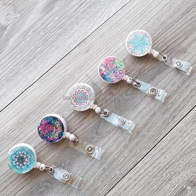 China Office Crystal Shell With Yo-Yo Retractable Key Flowers Holder Custom Logo For Office Worker Doctor Nurse Badge Reel Pull ID Card for sale